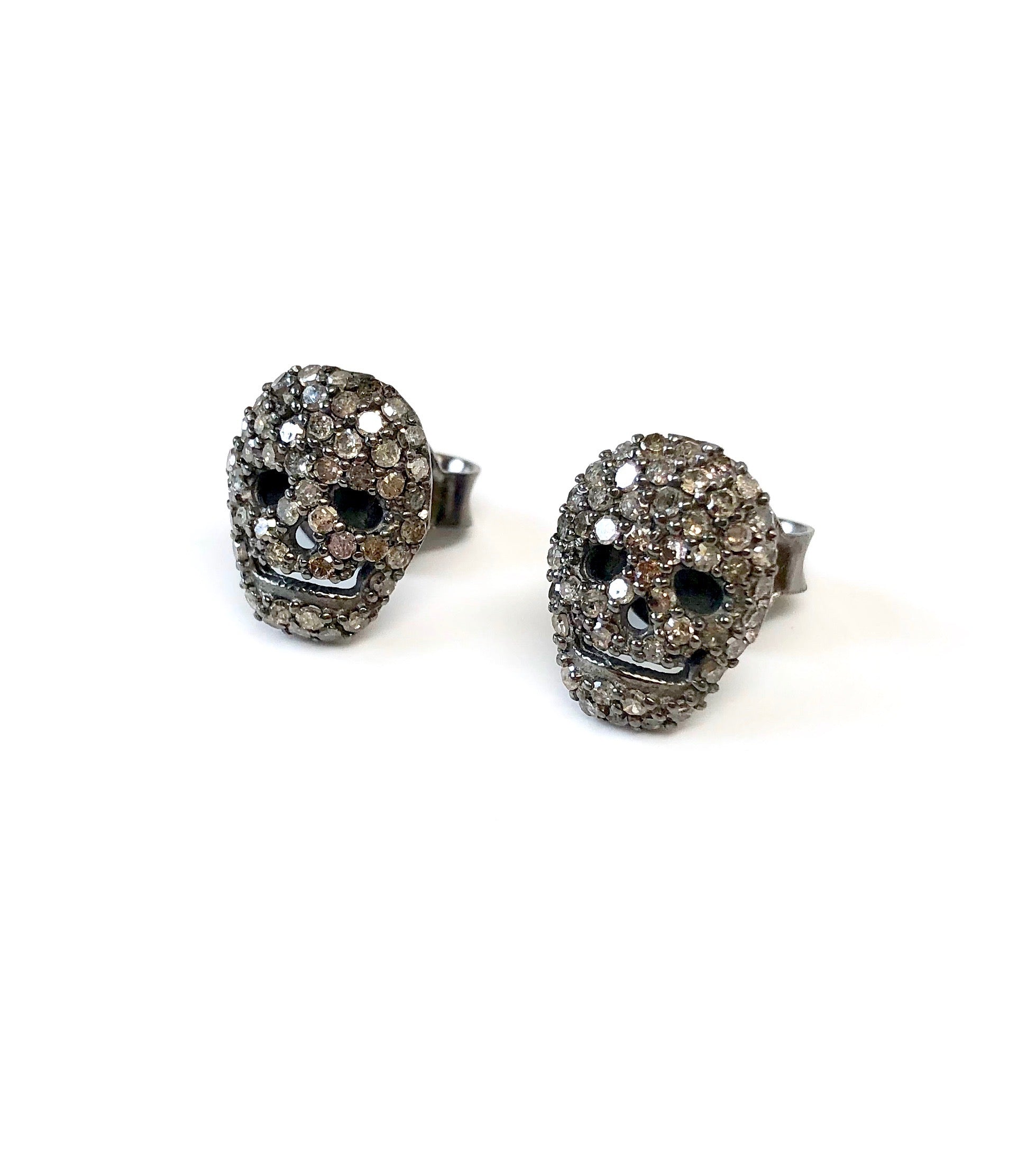 Diamond skull stud earrings on sale